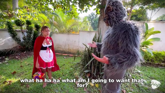 Little Red Riding Hood Has Lost A Fruit From Her Basket And She Is Looking For It In The Wolf'S Pants.